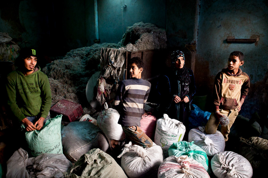 A family in Manshiyat Naser, also known as Garbage City, in Cairo, Egypt
