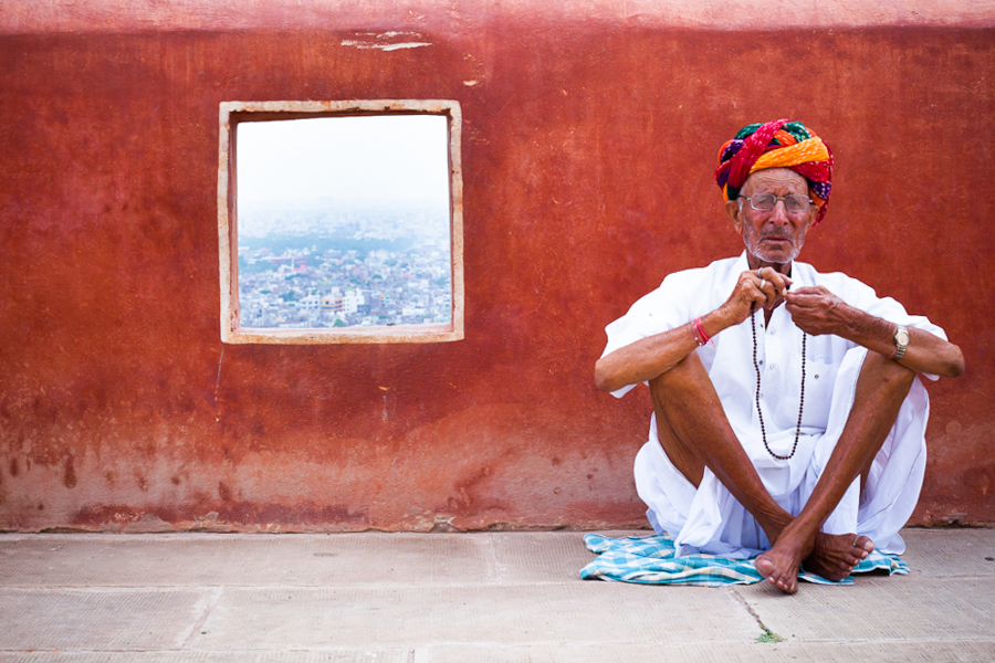 Monkey Temple, Jaipur, India: an old man resting on the way to the temple