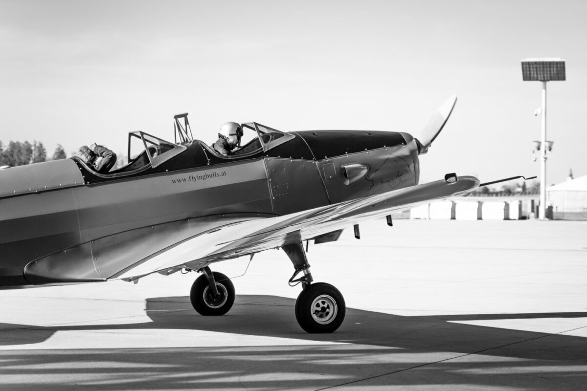 Fairchild PT-19 photograph after black-and-white Lightroom editing, the aircraft dark against a near-white sky