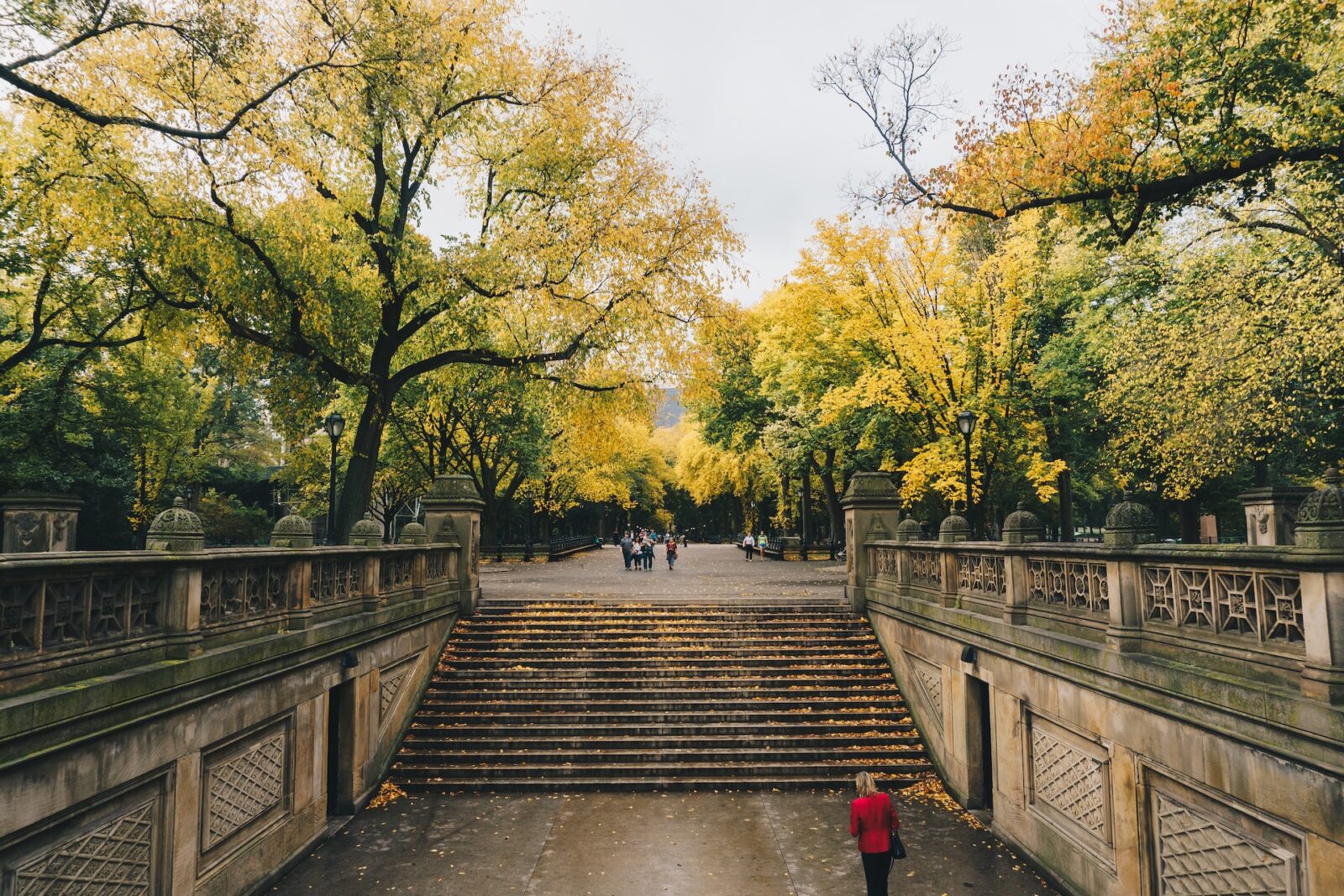 Bethesda Terrace steps leading south toward the tree-lined Mall in autumn