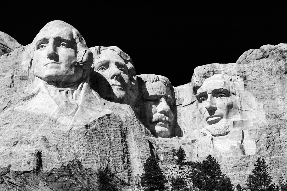 Black-and-white frontal photograph of the four faces at Mount Rushmore