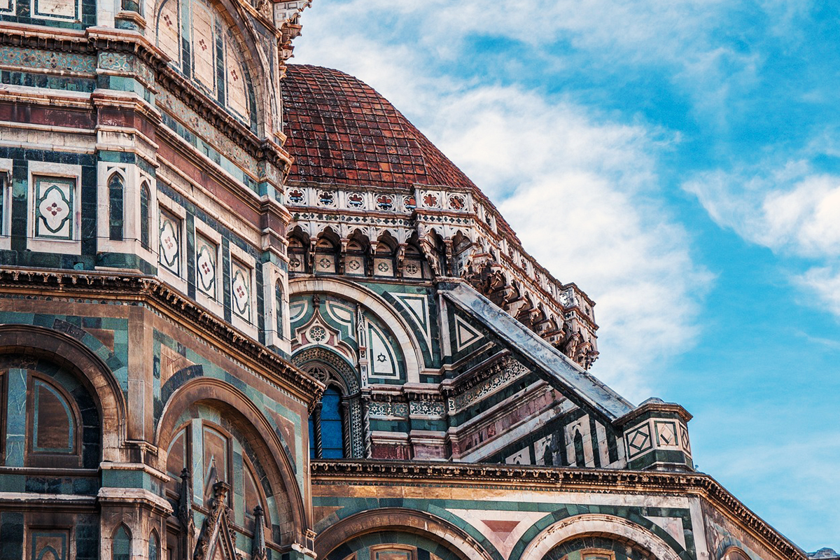A side view showing Brunelleschi's dome, the apses and the patterned marble exterior
