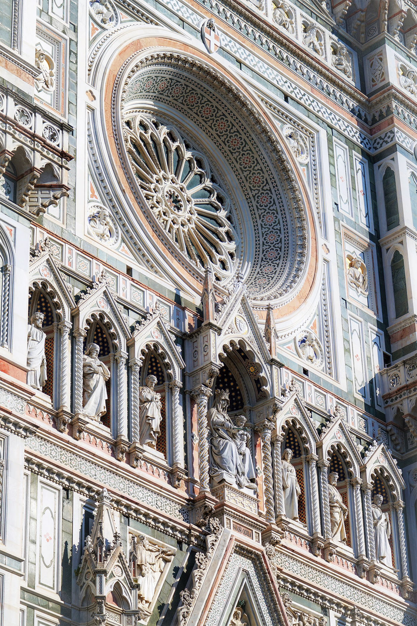 A vertical architectural study of the cathedral façade and its large rose window