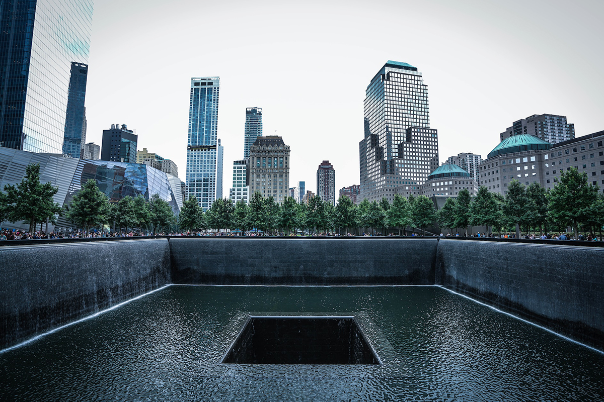The September 11 Memorial reflecting pools at the foot of the tower